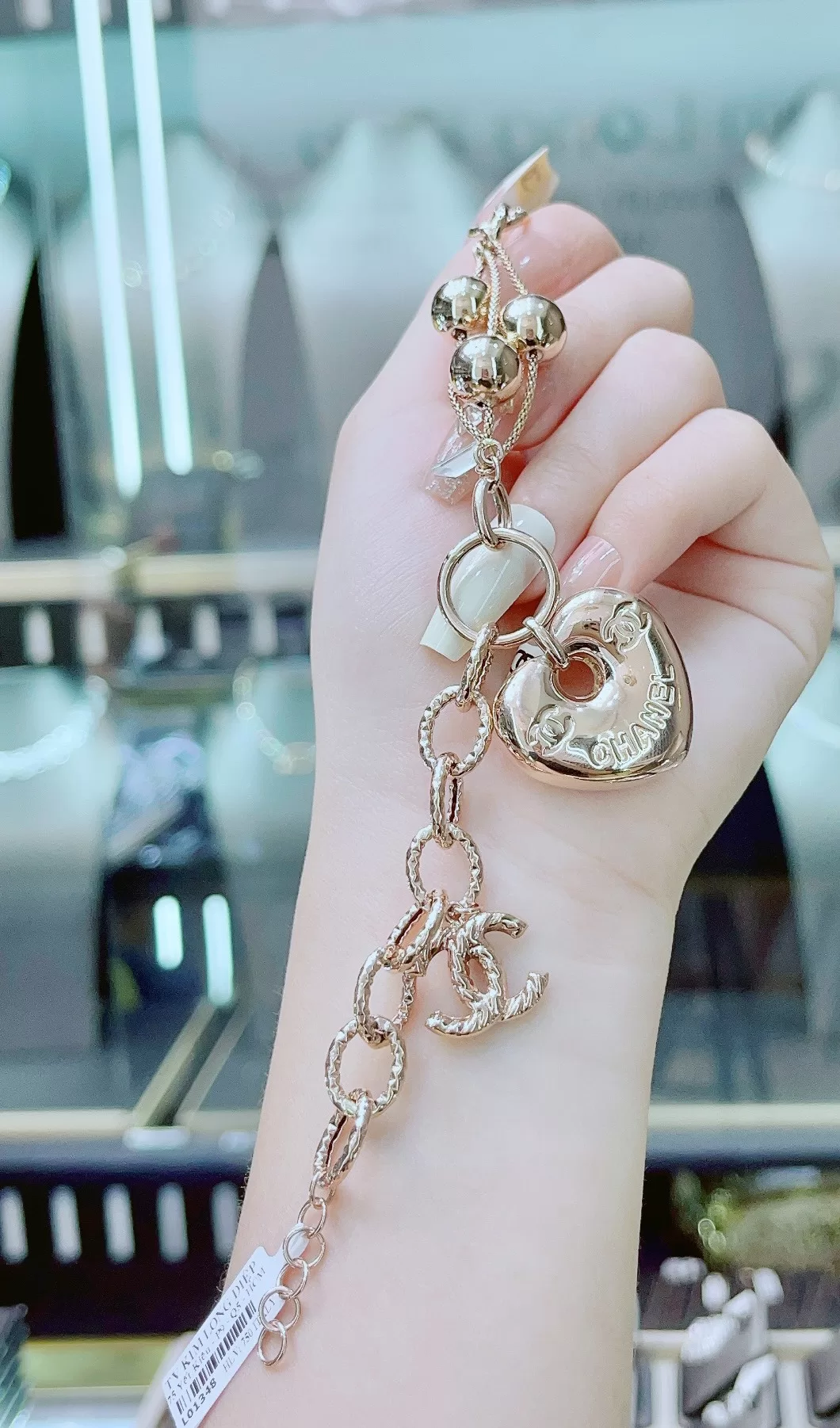 lắc tay vàng nữ dây xích-charm trái tim biểu tượng Chanel-15.77g